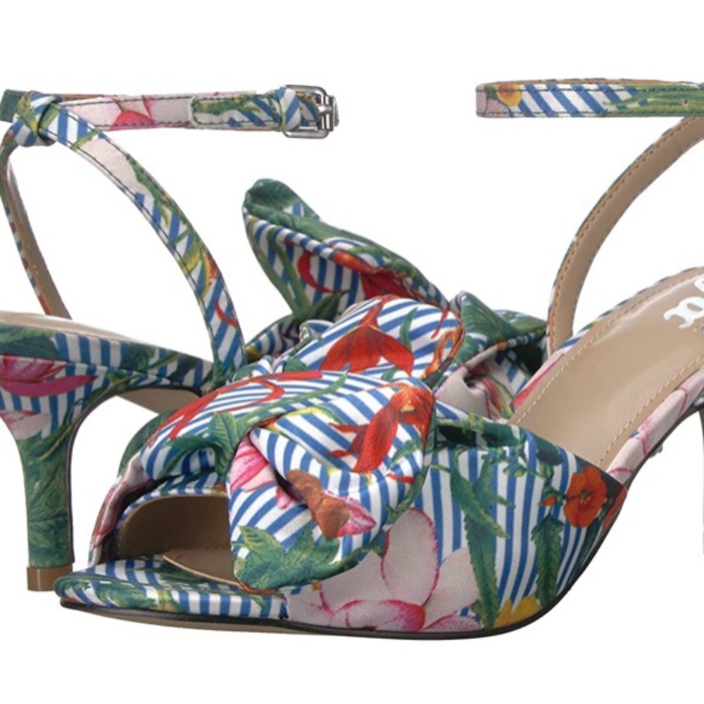 A tropical print heeled sandal w/ bow-accent toe!